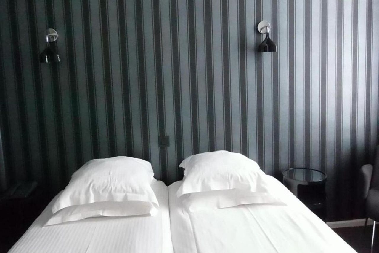 Hotel Queen Anne Brussel Bagian luar foto